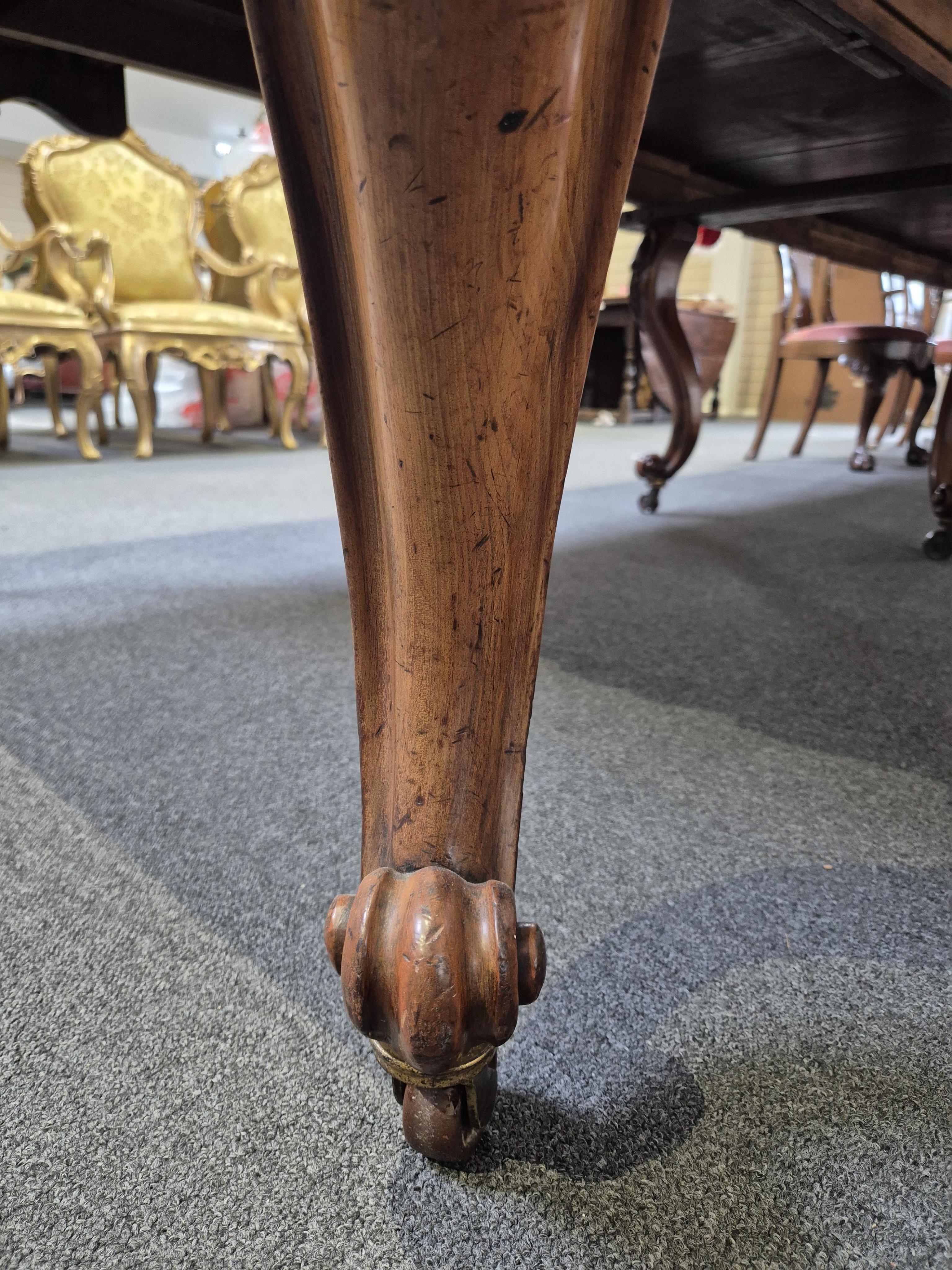 An unusually large William IV mahogany extending dining table